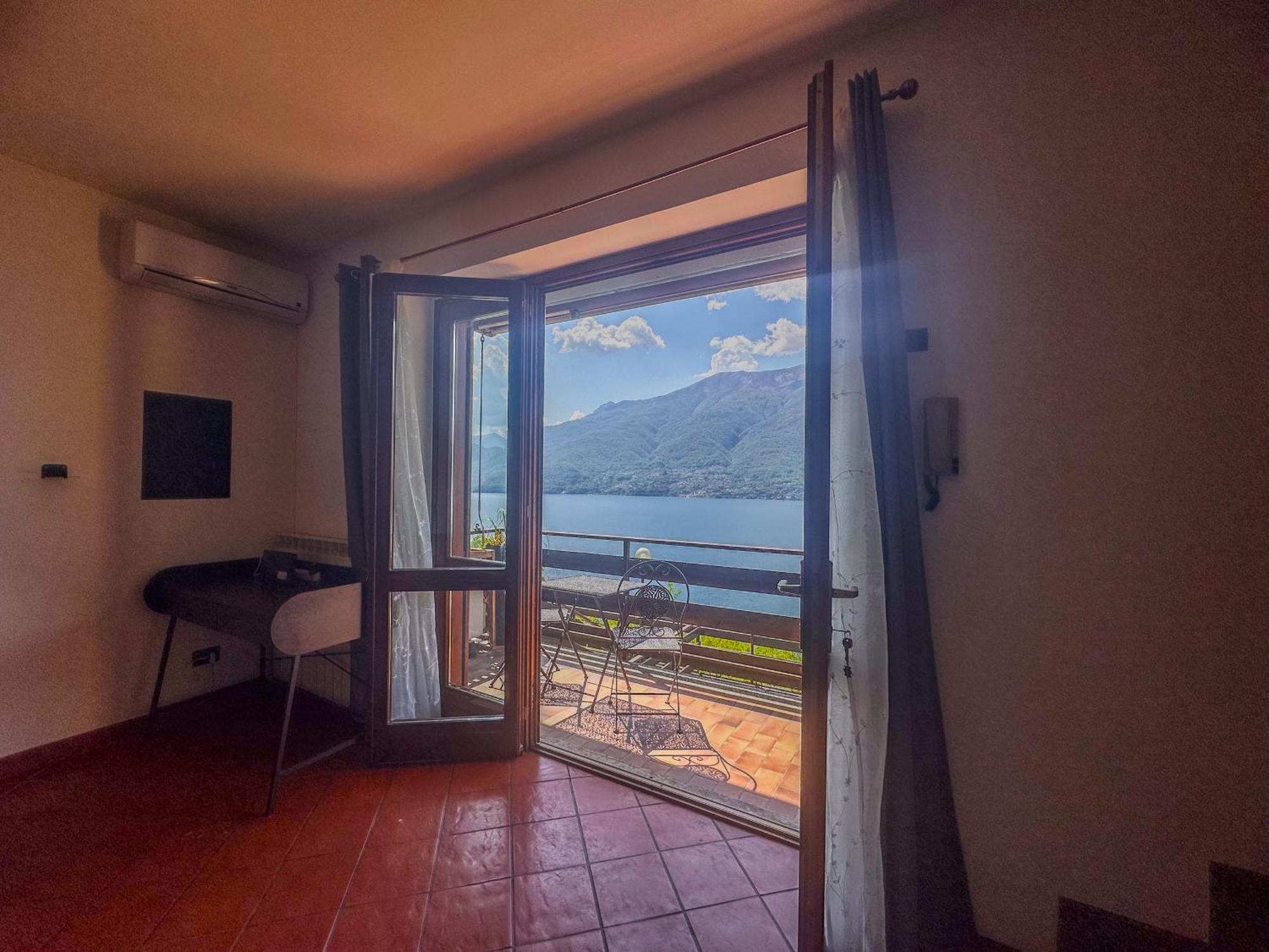Appartamento A Due Passi Dal Lago Con Box Дорио Экстерьер фото